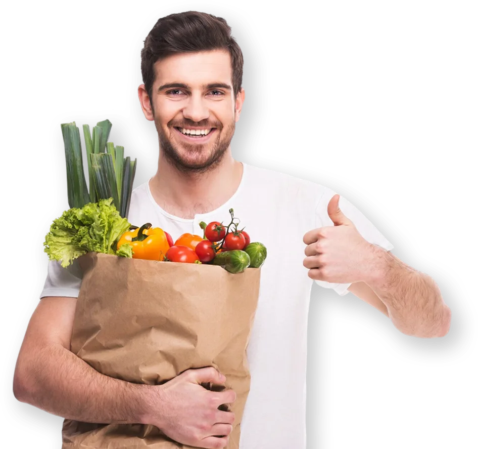 man holds lot vegetables bag